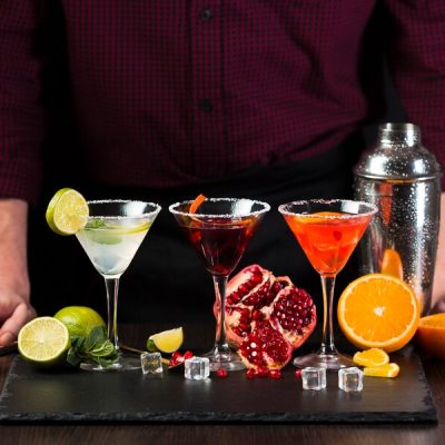 cocktail-glasses-with-decorations-front-man_23-2148454463